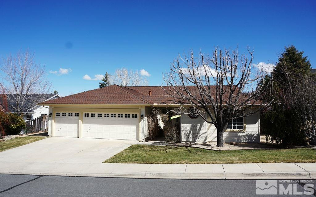 504 Silversmith Place Reno, NV 89511 - Photo 1 of 1 a front view of a house with a yard
