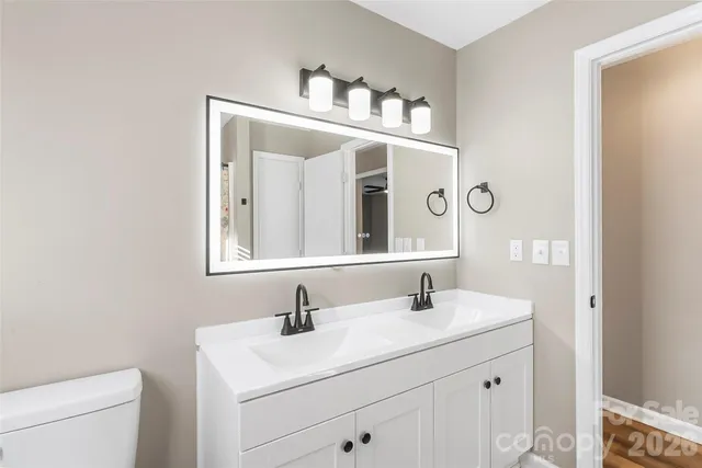 a bathroom with a shower curtain