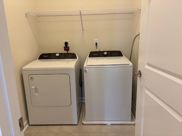 4 Stratton Drive, Unit 301 Woburn, MA 01801 - Photo 16 of 24 a utility room with dryer and washer