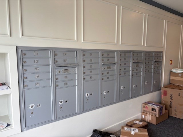 4 Stratton Drive, Unit 301 Woburn, MA 01801 - Photo 6 of 24 a living room with furniture