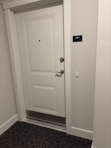 4 Stratton Drive, Unit 301 Woburn, MA 01801 - Photo 7 of 24 a view of utility room