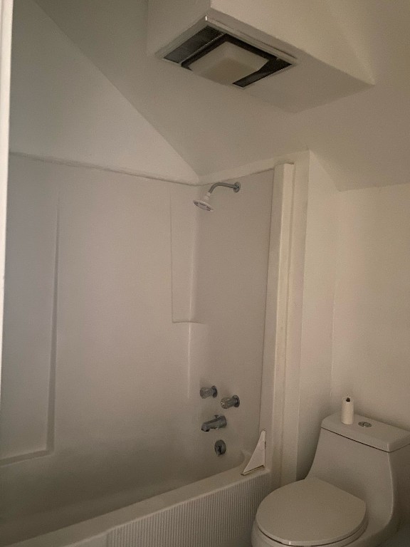 800 Travis Street, Unit ATTIC Columbus, TX 78934 - Photo 5 of 6 a white toilet sitting next to a bath tub