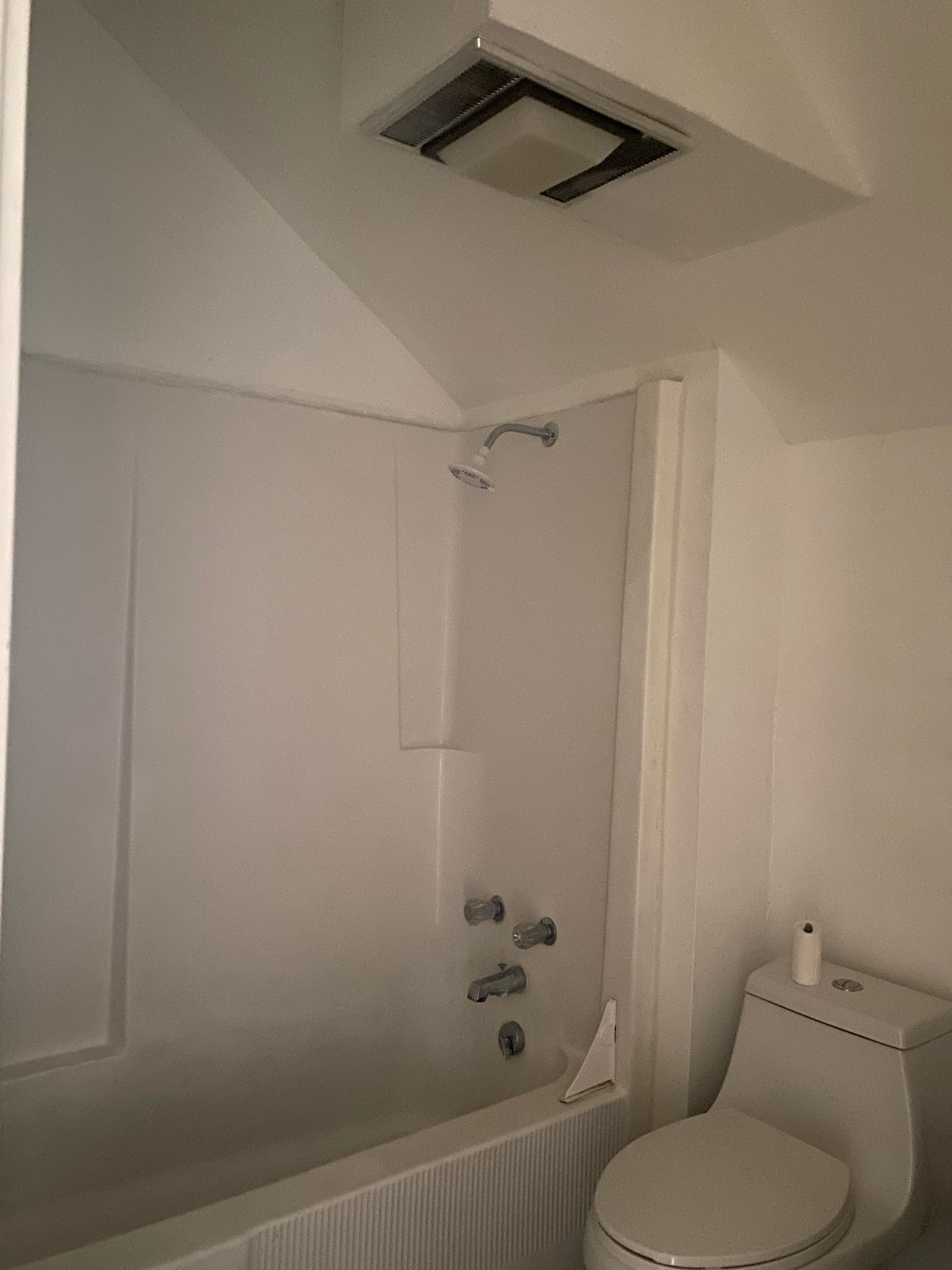 800 Travis Street, Unit ATTIC Columbus, TX 78934 - Photo 5 of 6 a white toilet sitting next to a bath tub