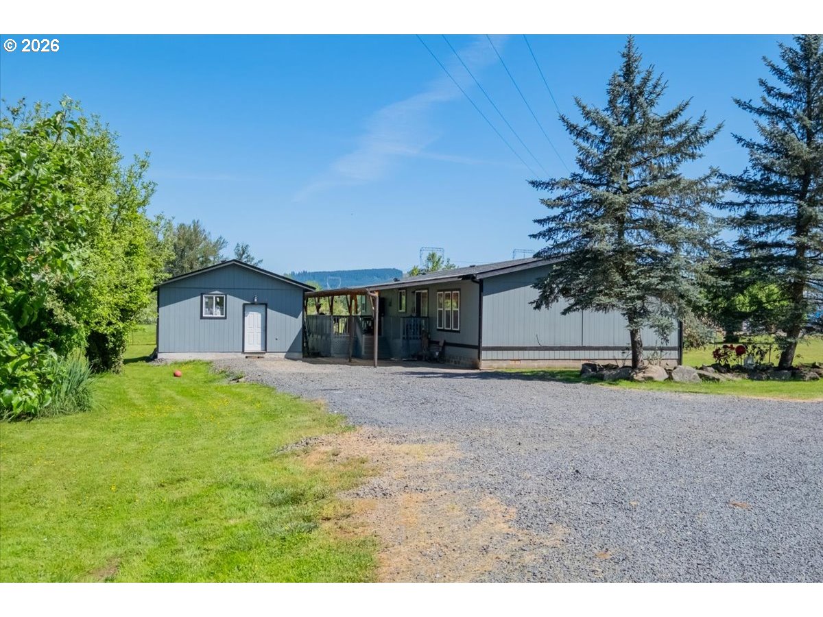 35377 Ede Road Lebanon, OR 97355 - Photo 3 of 48 a view of a house with a yard and tree