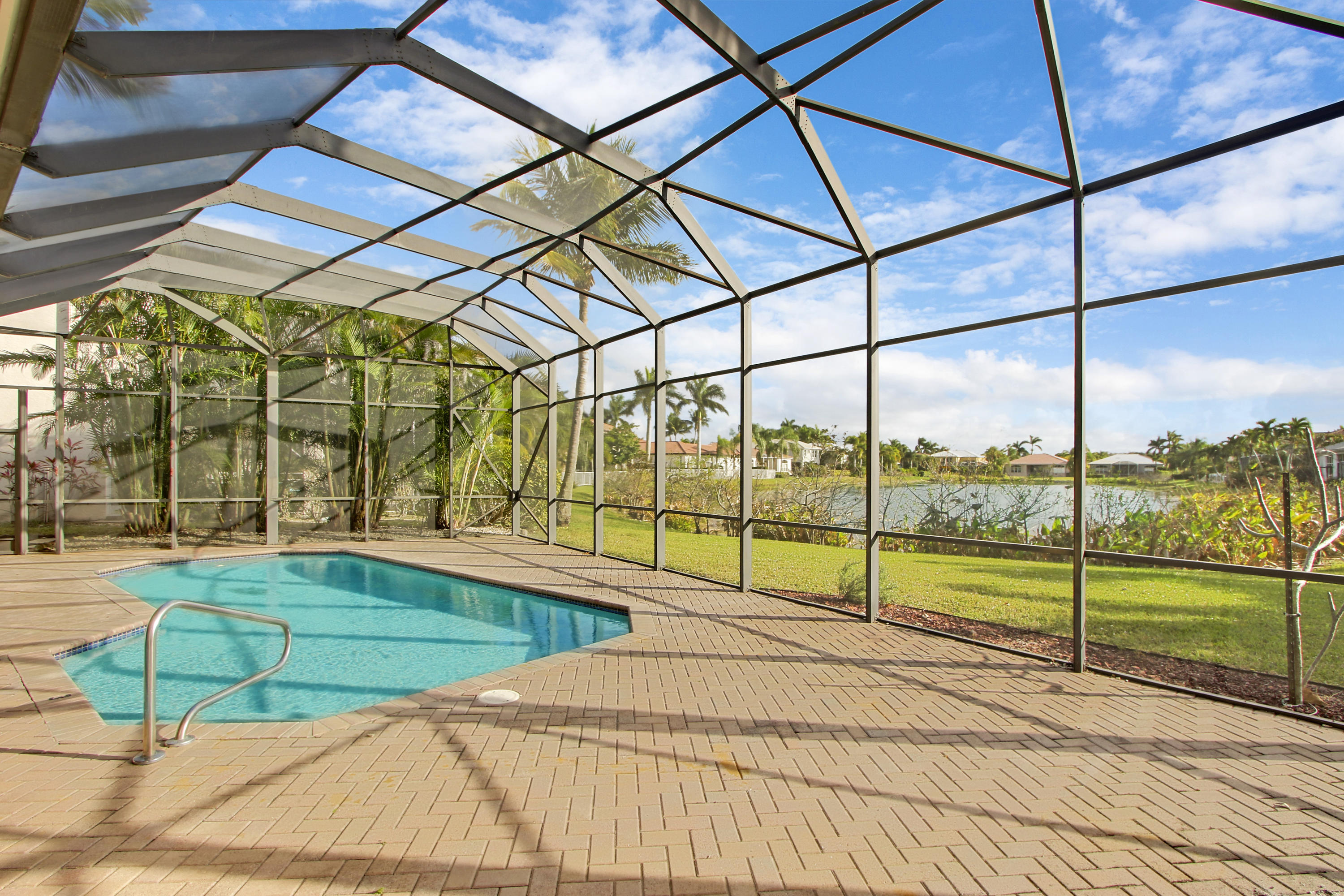 18561 Ocean Mist Drive Boca Raton, FL 33498 - Photo 18 of 29 Pool Deck & Lake