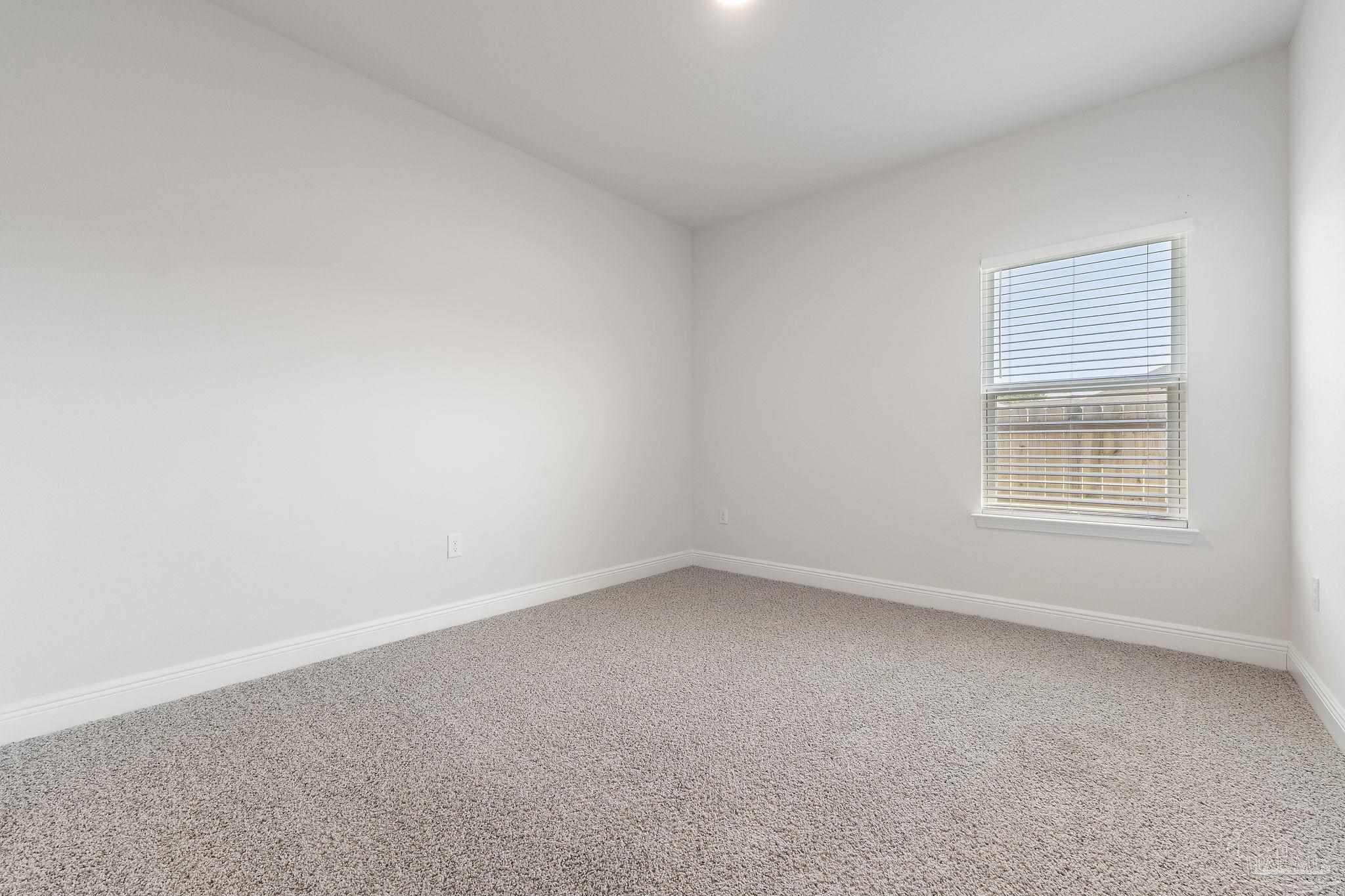 7737 Burnside Loop Pensacola, FL 32526 - Photo 21 of 33 an empty room with a window