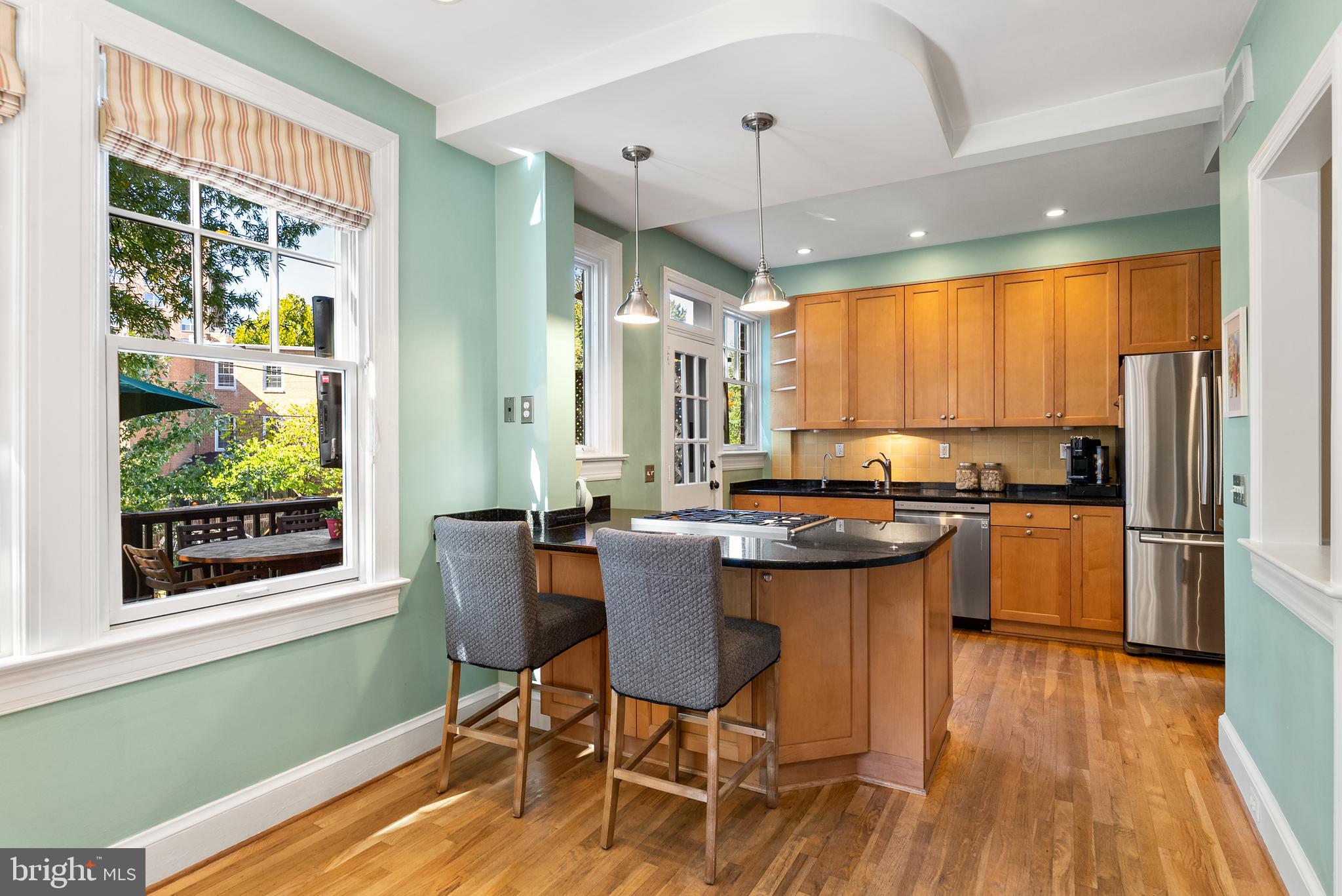 2812 39th Street Northwest Washington, DC 20007 - Photo 10 of 33 Open, eat-in-kitchen w/granite, SS, gas cooking