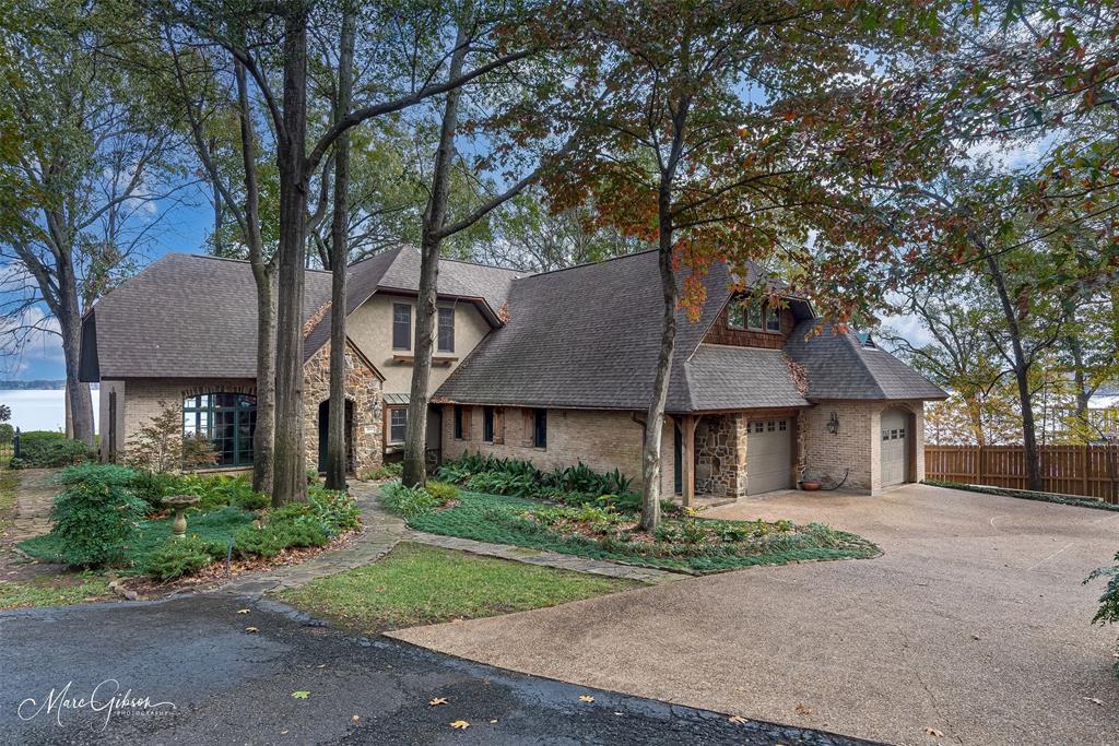 3045 Risinger Drive Shreveport, LA 71119 - Photo 38 of 40 front view of a house with a trees