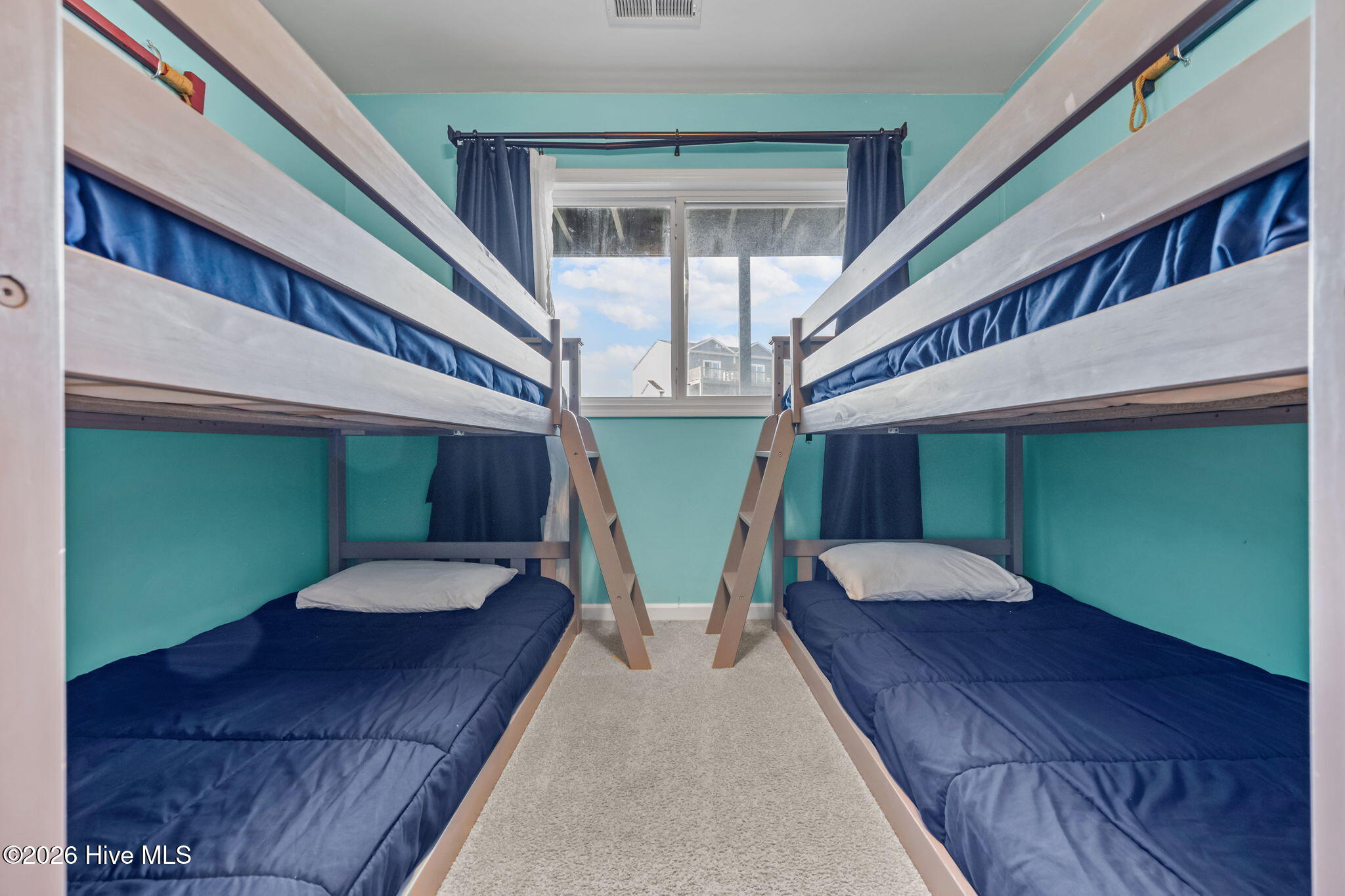 1928 New River Inlet Road, Unit 214 North Topsail Beach, NC 28460 - Photo 31 of 50 Guest Bedroom 2