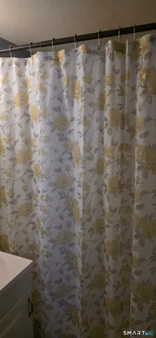 a bathroom with a toilet and a sink