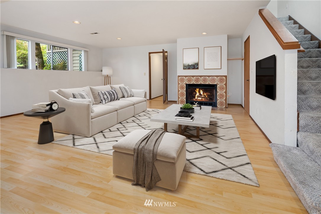 521 South 28th Place Renton, WA 98055 - Photo 12 of 20 a living room with furniture and a fireplace