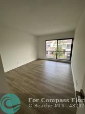 Undisclosed Address Fort Lauderdale, FL 33319 - Photo 13 of 19 a view of an empty room with a window