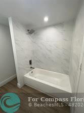 Undisclosed Address Fort Lauderdale, FL 33319 - Photo 15 of 19 a bathroom with a bathtub and a toilet