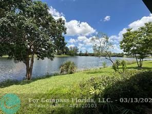 Undisclosed Address Fort Lauderdale, FL 33319 - Photo 19 of 19 a view of outdoor space with deck and green space