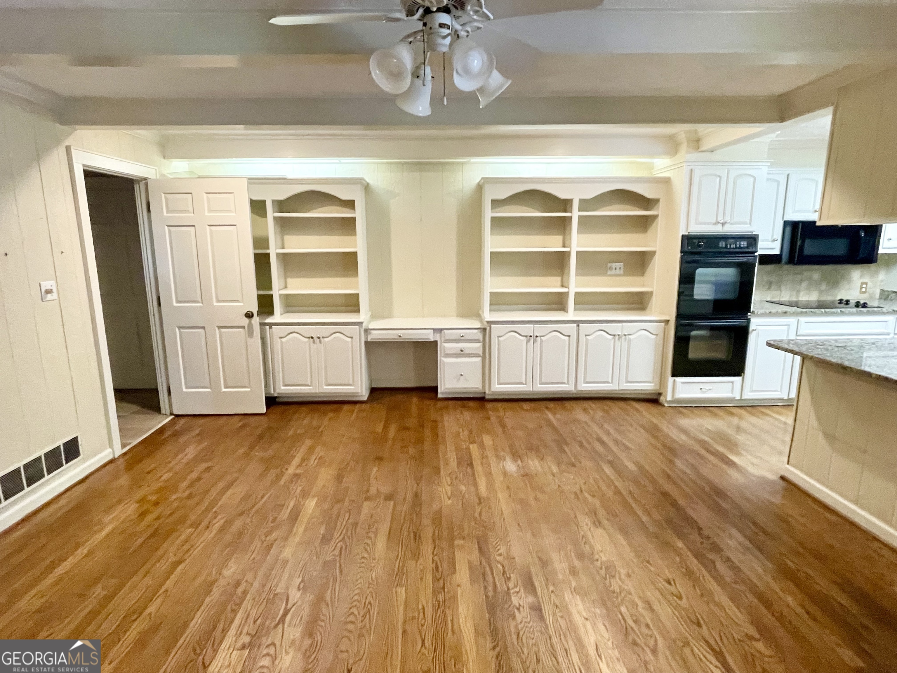11 Cumberland Drive Southeast Rome, GA 30161 - Photo 15 of 29 a view of a kitchen with a sink and dishwasher with wooden floor