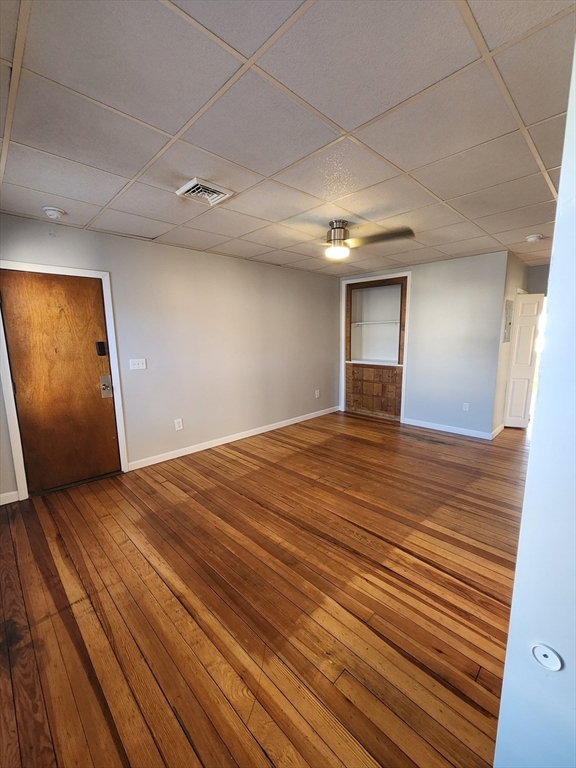 920 Pine Street, Unit 3W Fall River, MA 02720 - Photo 3 of 9 a view of empty room with wooden floor