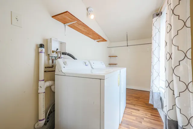 a utility room with dryer and washer