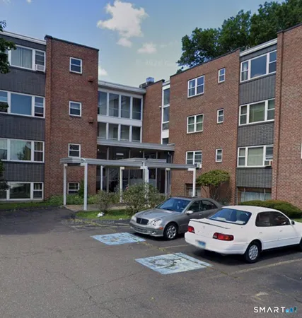 a cars parked in front of a building