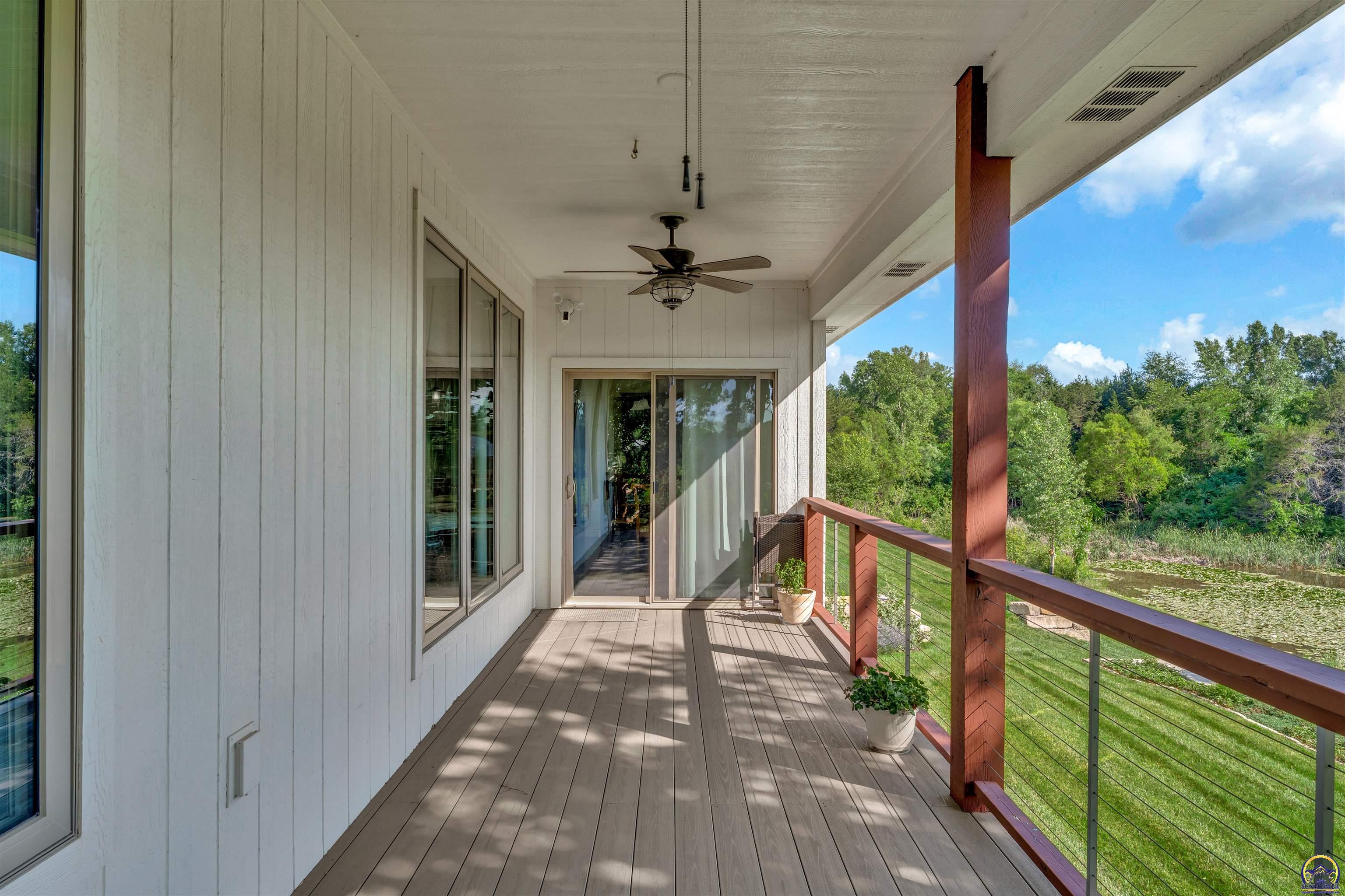 6131 Southwest 47th Street Topeka, KS 66610 - Photo 19 of 20 Back patio from Walk-Out