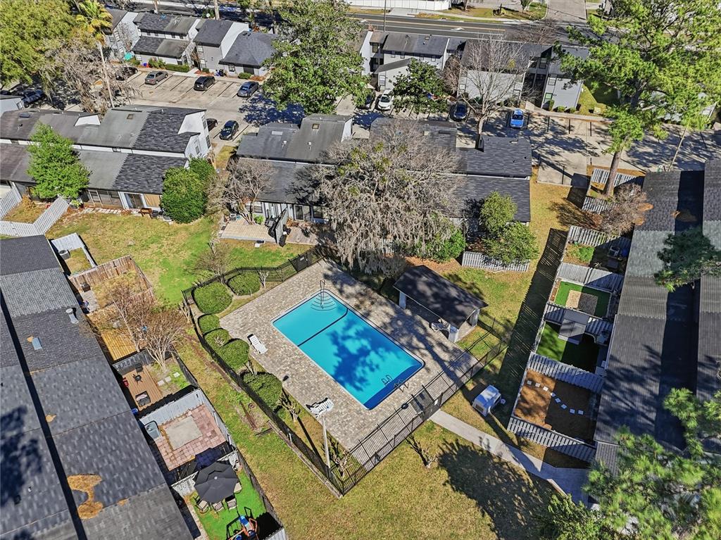 4427 Southwest 21st Lane Gainesville, FL 32607 - Photo 2 of 36 an aerial view of a house with a yard and lake view