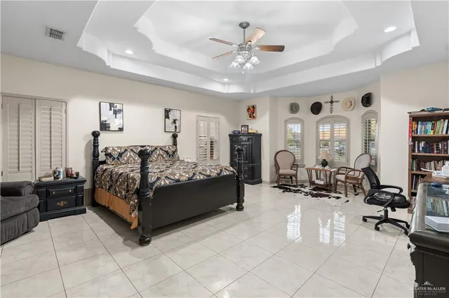 a room with furniture and a book shelf