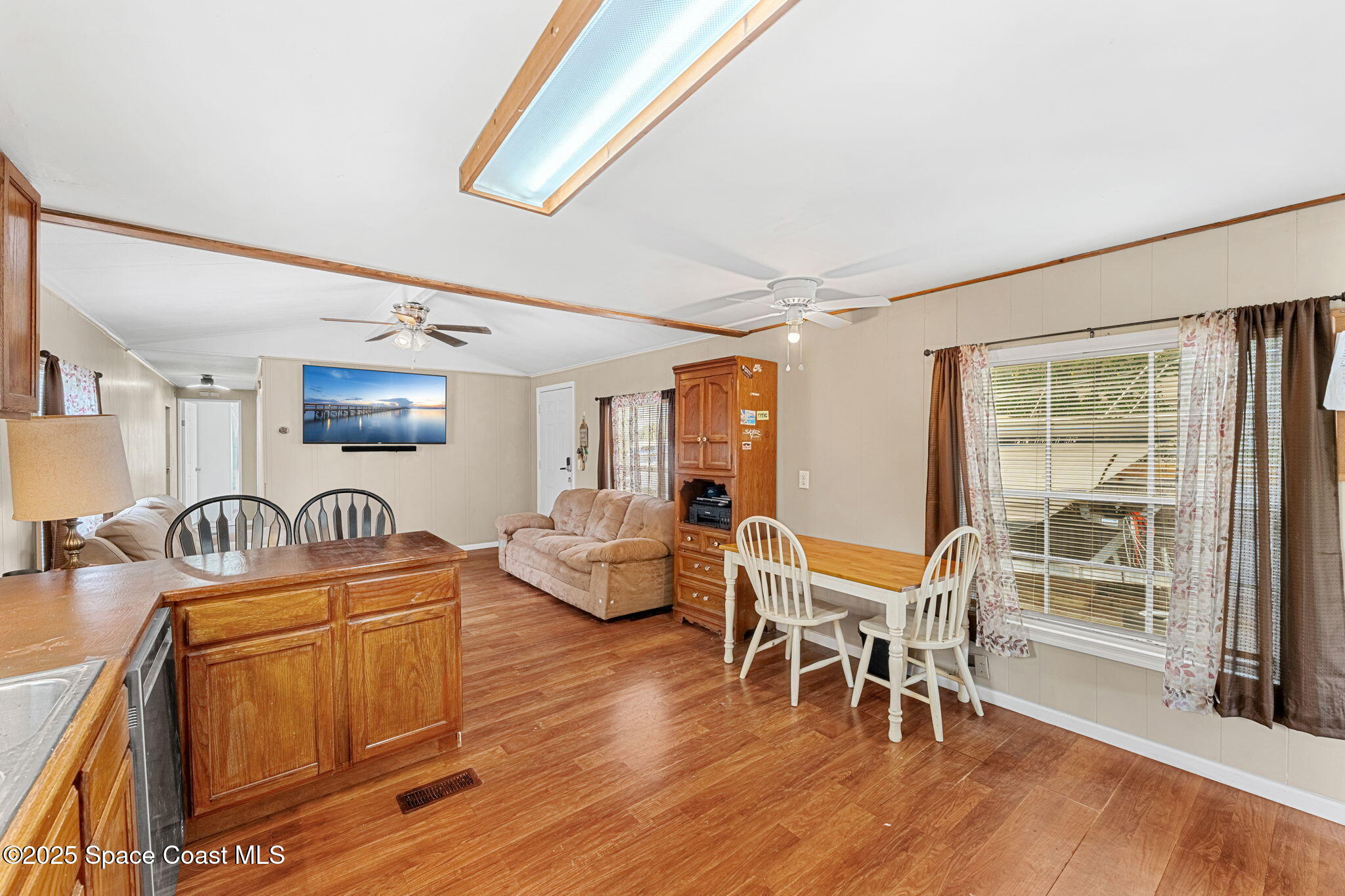 517 Bowman Boulevard Cocoa, FL 32927 - Photo 16 of 38 a living room with furniture and a wooden floor