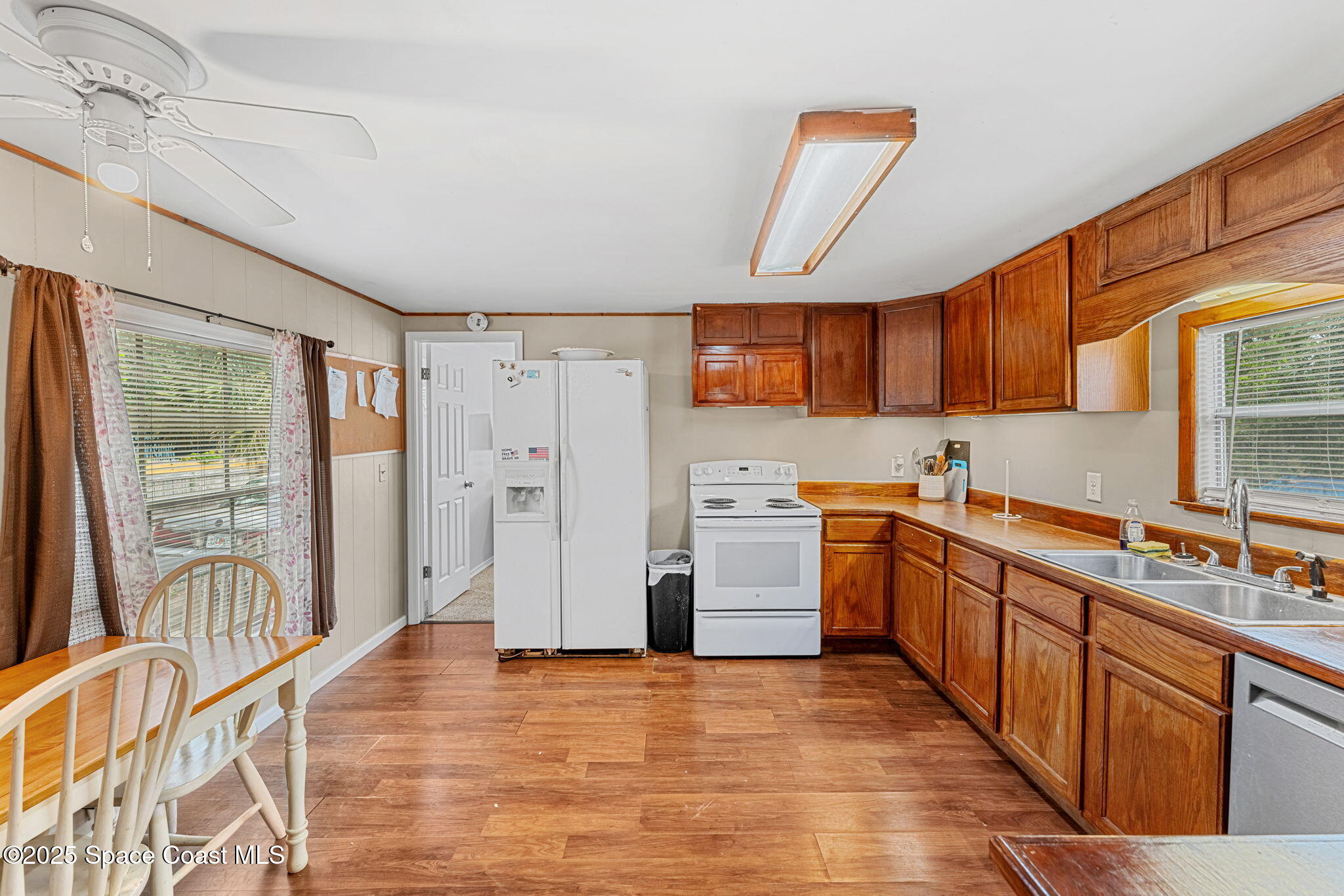 517 Bowman Boulevard Cocoa, FL 32927 - Photo 20 of 38 a kitchen with stainless steel appliances granite countertop a refrigerator and a stove top oven