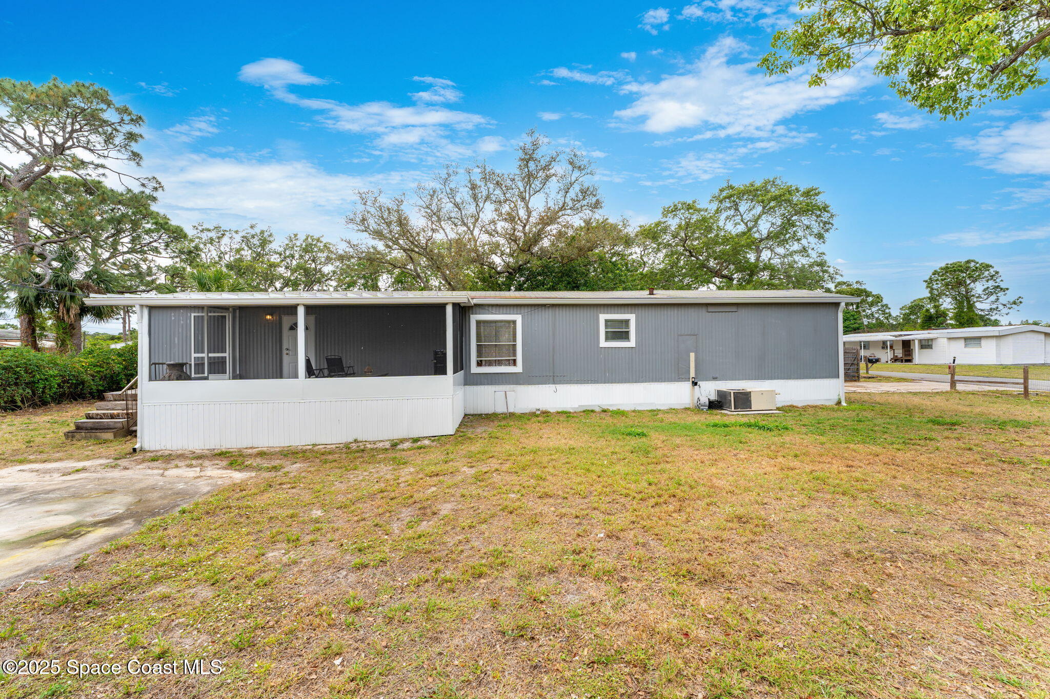 517 Bowman Boulevard Cocoa, FL 32927 - Photo 2 of 38 a view of house with outdoor space