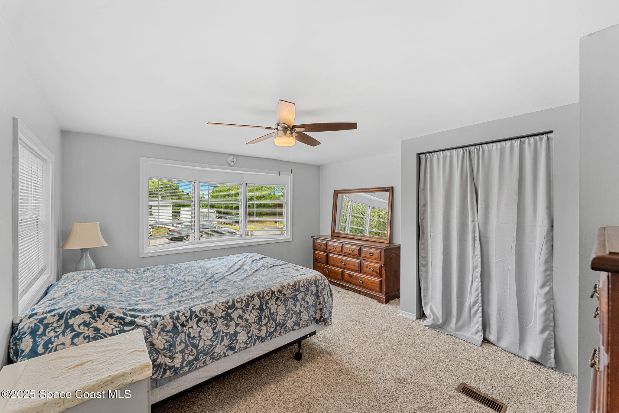 517 Bowman Boulevard Cocoa, FL 32927 - Photo 21 of 38 a bedroom with a large bed and a window