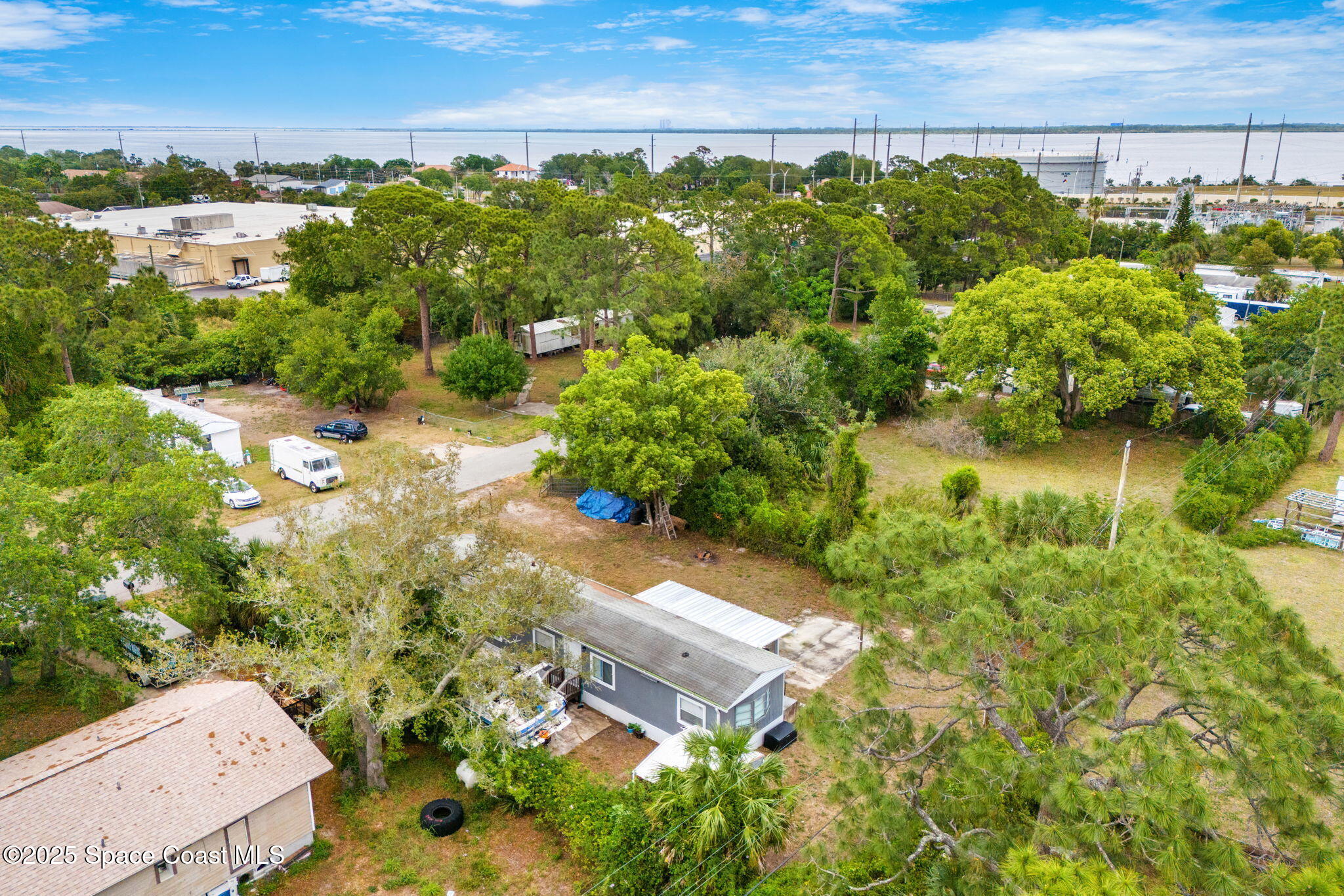 517 Bowman Boulevard Cocoa, FL 32927 - Photo 35 of 38 an aerial view of a house with a yard
