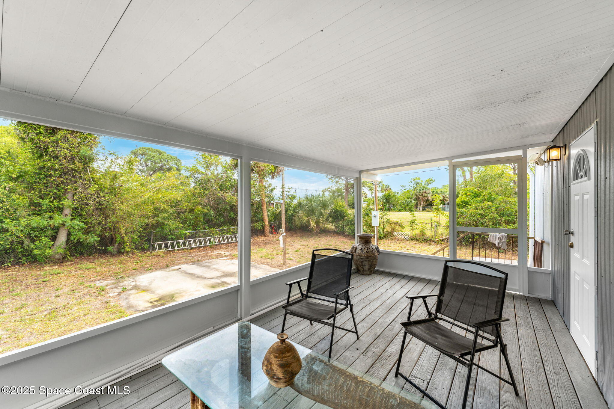 517 Bowman Boulevard Cocoa, FL 32927 - Photo 8 of 38 a living room with a large window