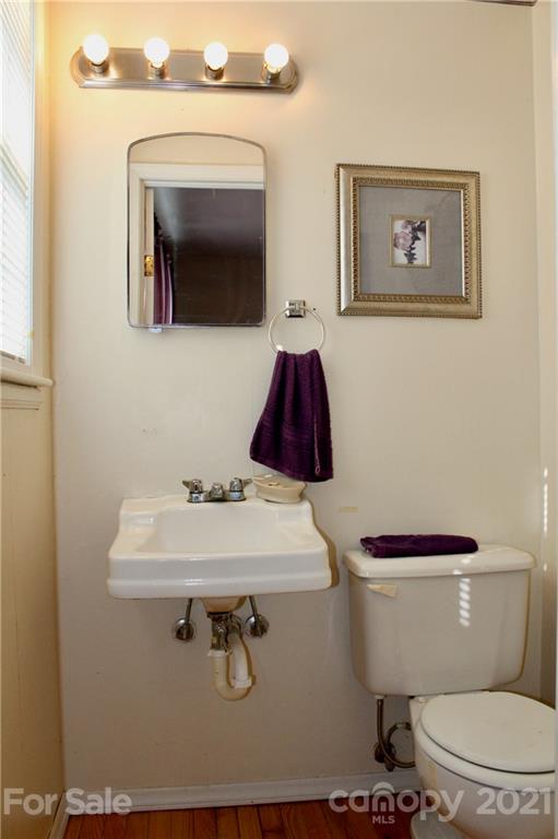 2411 Poors Ford Road Rutherfordton, NC 28139 - Photo 15 of 19 a bathroom with a toilet sink and mirror