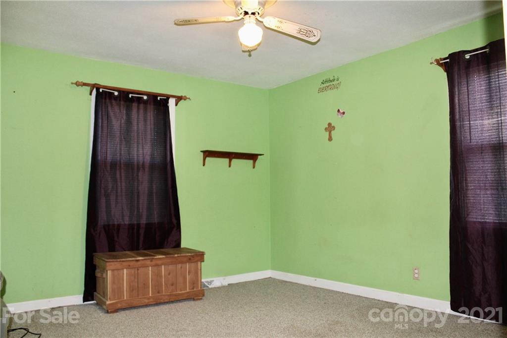 2411 Poors Ford Road Rutherfordton, NC 28139 - Photo 17 of 19 a view of a room with wooden floor and cabinet