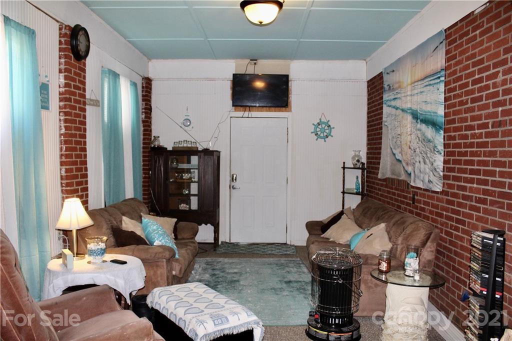 2411 Poors Ford Road Rutherfordton, NC 28139 - Photo 9 of 19 a living room with furniture and flat screen tv