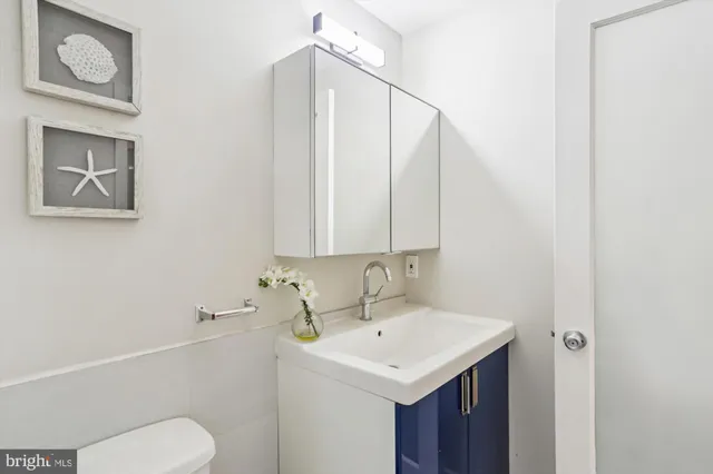 a view of balcony with wooden floor and fence