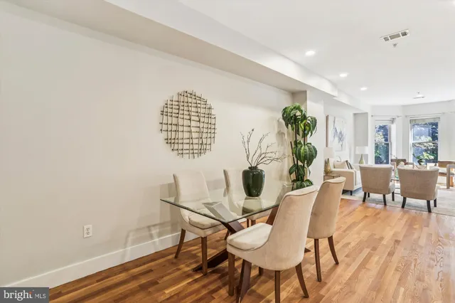 a workspace with furniture and a potted plant