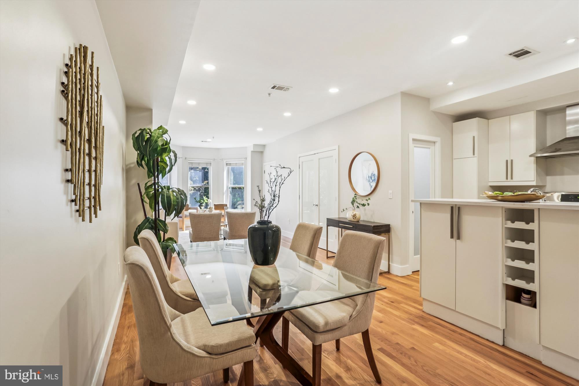 3222 13th Street Northwest, Unit 2 Washington, DC 20010 - Photo 19 of 52 a view of a dining room with furniture window and wooden floor