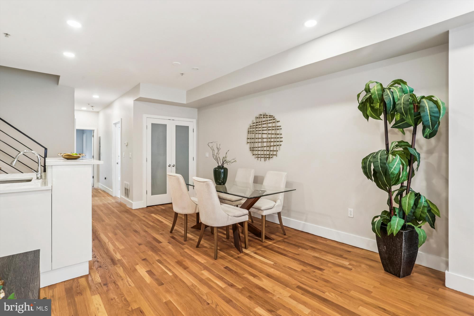 3222 13th Street Northwest, Unit 2 Washington, DC 20010 - Photo 20 of 52 a workspace with furniture and a potted plant