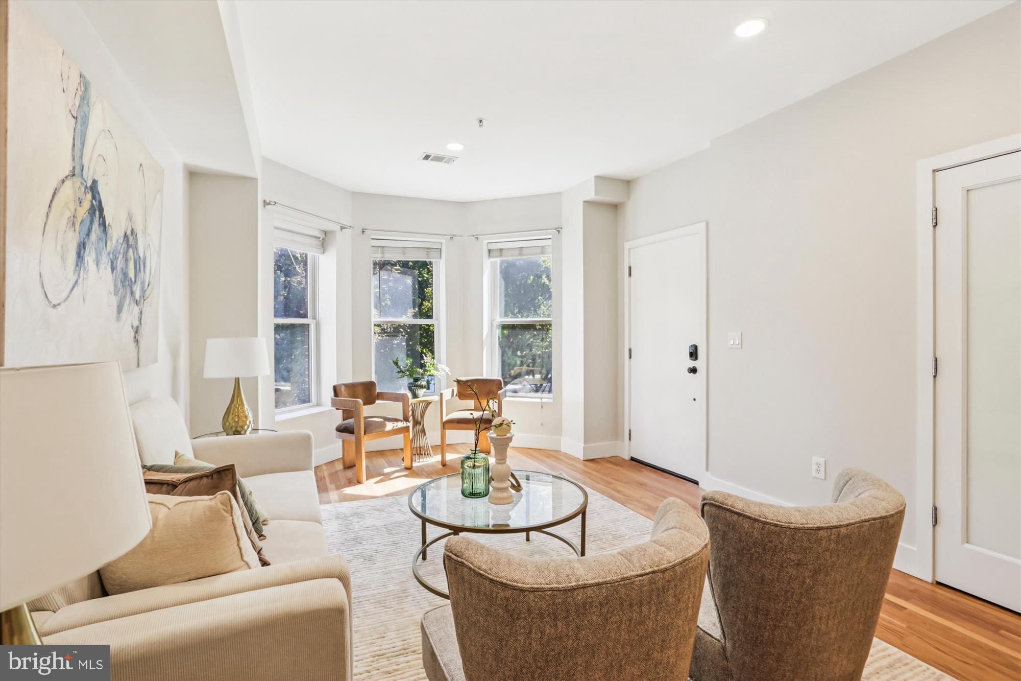 3222 13th Street Northwest, Unit 2 Washington, DC 20010 - Photo 27 of 52 a living room with furniture and a large window