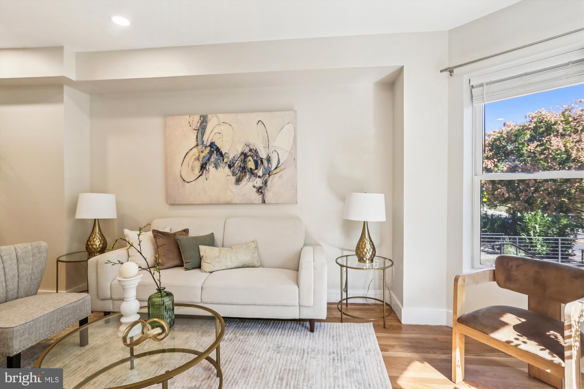 3222 13th Street Northwest, Unit 2 Washington, DC 20010 - Photo 29 of 52 a living room with furniture and a large window
