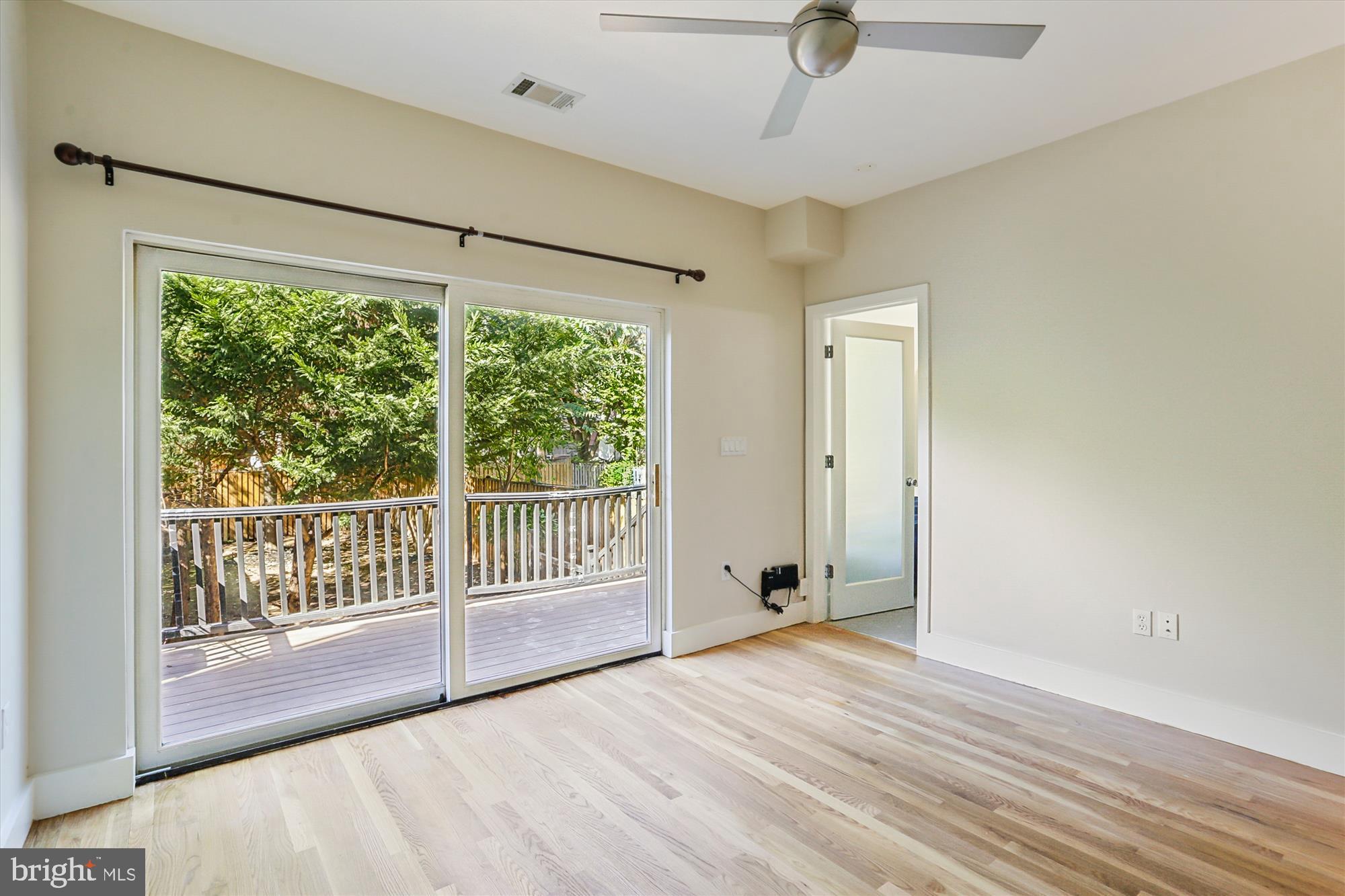 3222 13th Street Northwest, Unit 2 Washington, DC 20010 - Photo 33 of 52 wooden floor in an empty room with a window