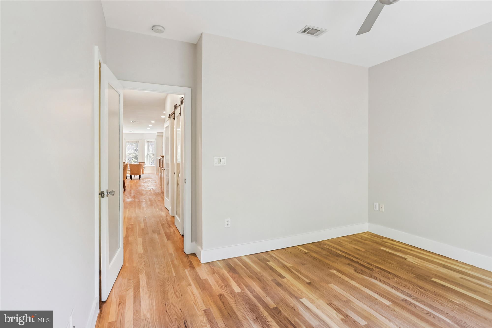 3222 13th Street Northwest, Unit 2 Washington, DC 20010 - Photo 34 of 52 a view of a room with wooden floor and a bathroom
