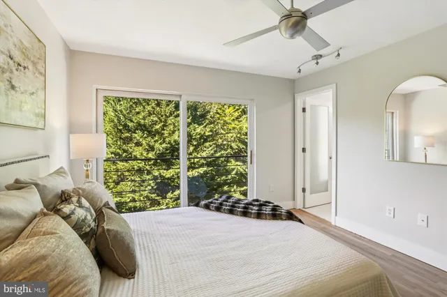 a view of entryway with wooden floor