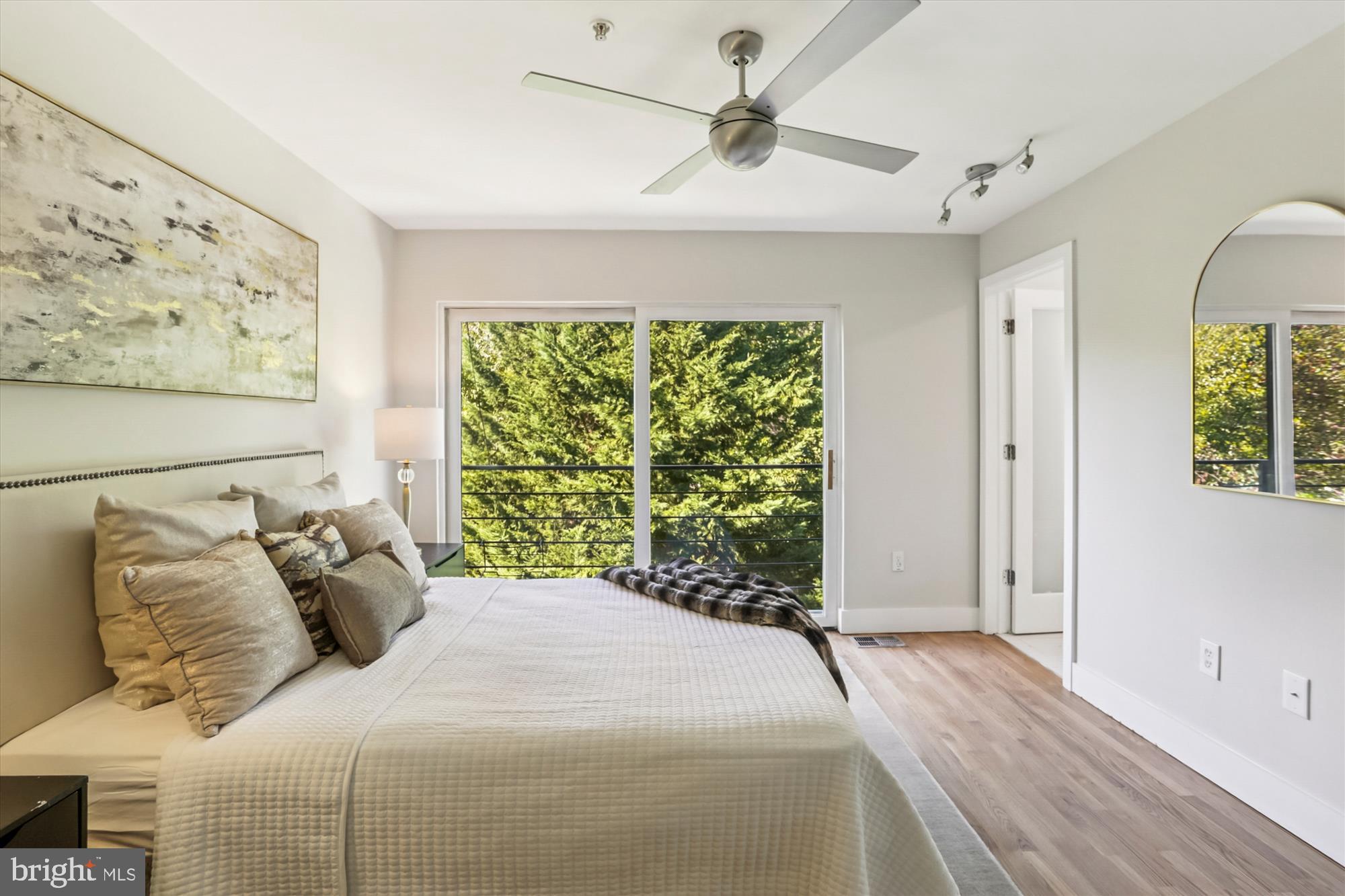 3222 13th Street Northwest, Unit 2 Washington, DC 20010 - Photo 47 of 52 a bedroom with a bed and a window