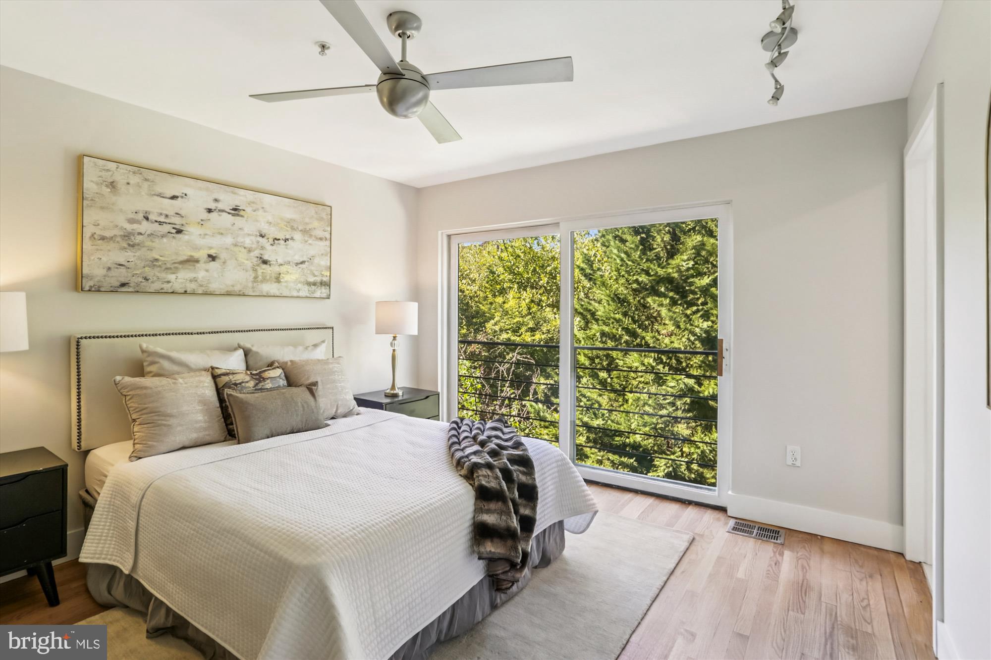 3222 13th Street Northwest, Unit 2 Washington, DC 20010 - Photo 48 of 52 a bedroom with a large bed and a window