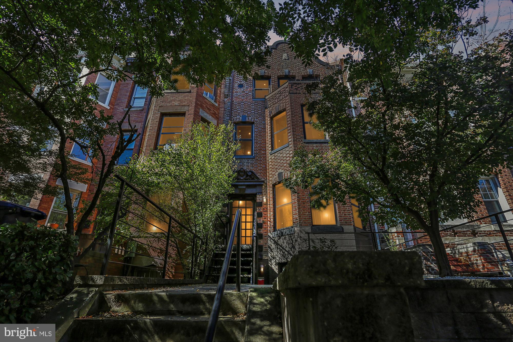 3222 13th Street Northwest, Unit 2 Washington, DC 20010 - Photo 51 of 52 a front view of a house with a yard