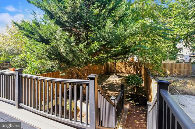 a view of a chairs and table in the outdoor space