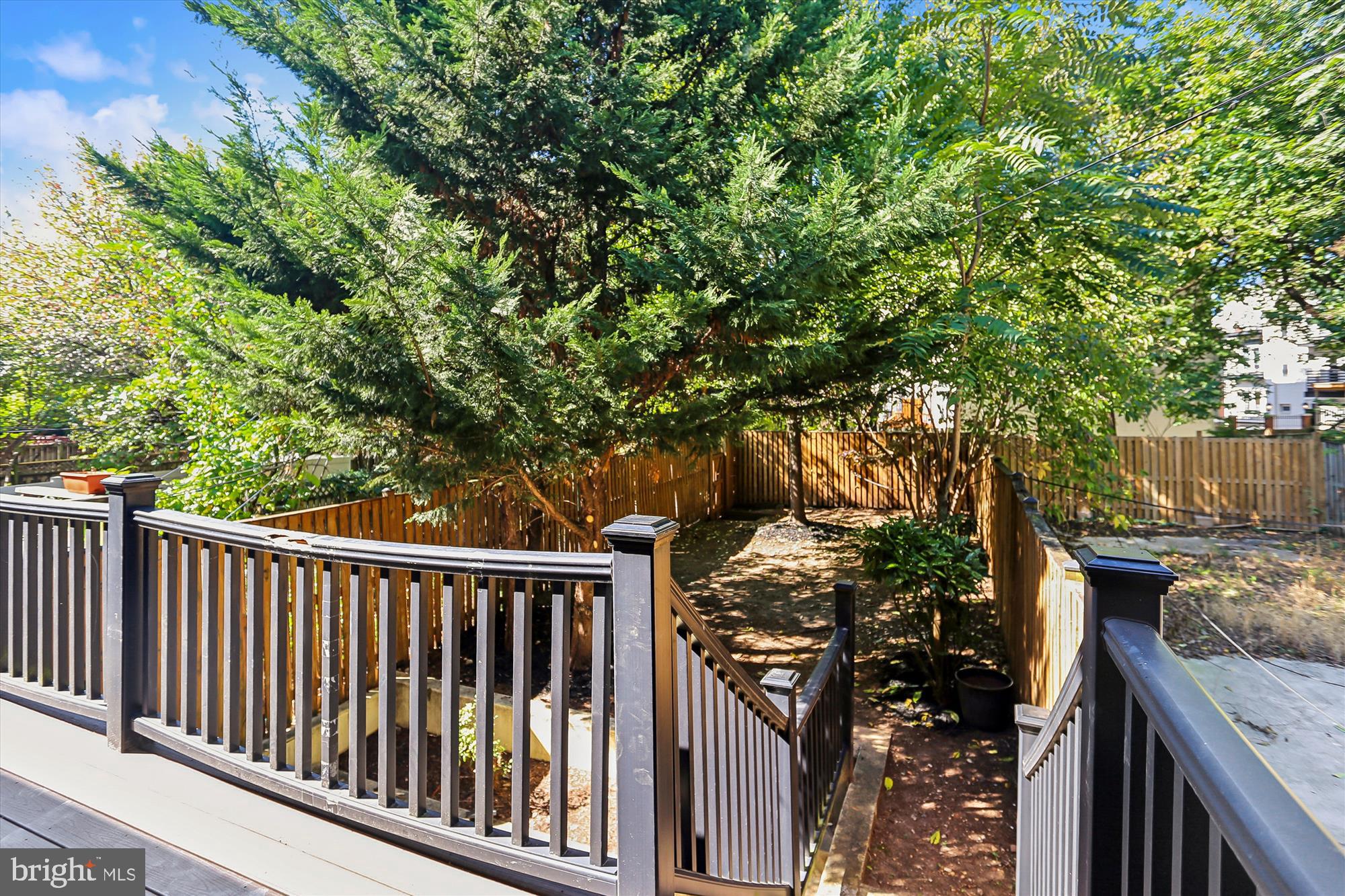 3222 13th Street Northwest, Unit 2 Washington, DC 20010 - Photo 6 of 52 a view of a backyard from a balcony