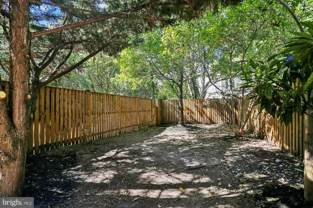 a bath room with a toilet and a shower