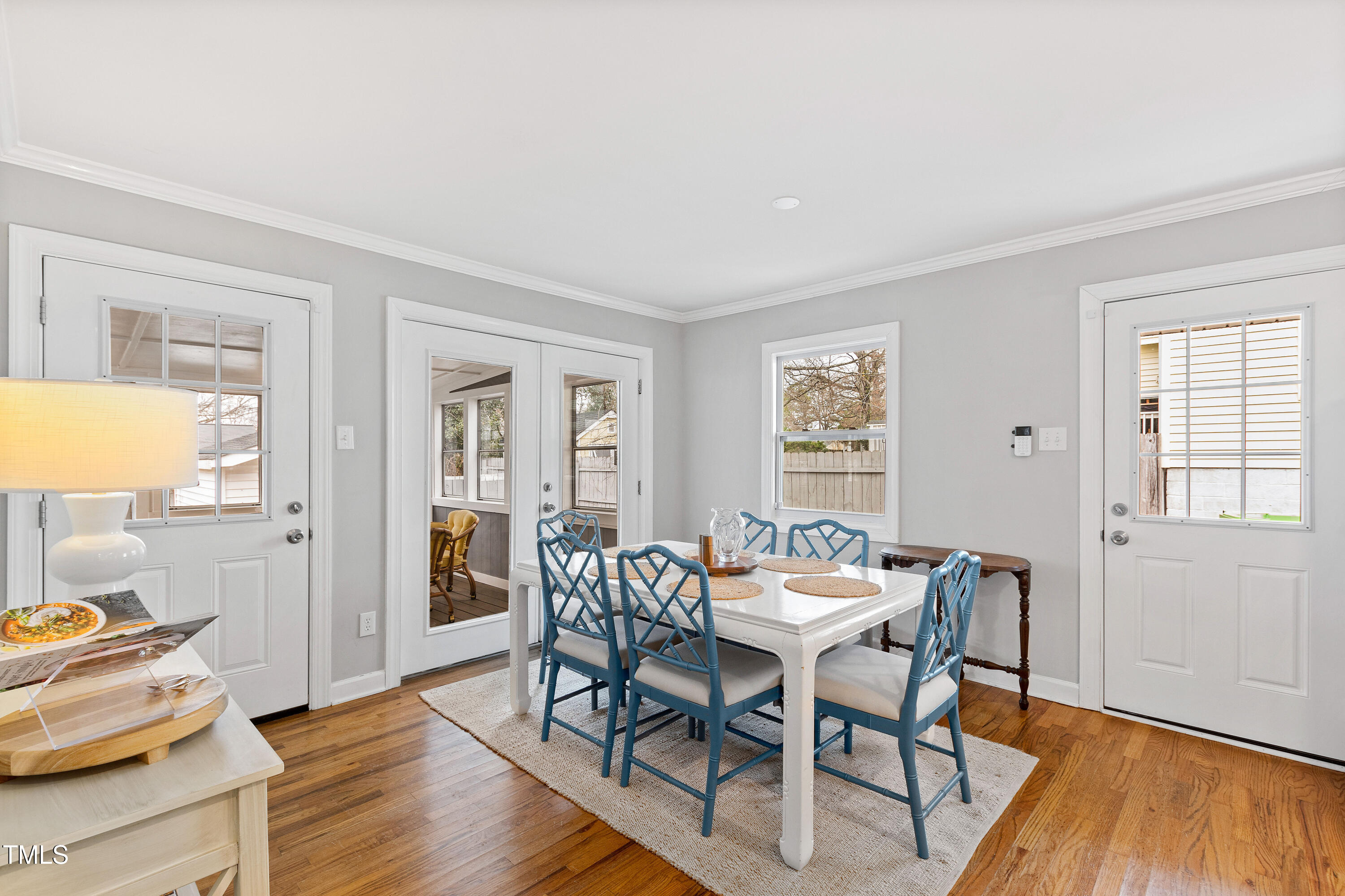 1817 Rankin Street Raleigh, NC 27604 - Photo 13 of 31 a view of a dining room with furniture and wooden floor